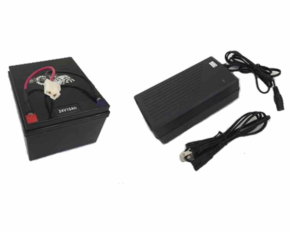 The Lithium Ion Ncm 24V Battery With Charger includes a black rectangular 24V 10Ah battery with red and black terminals, a white connector, and a black charger with coiled power and detachable cables.