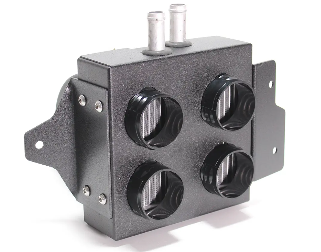 The Inferno Cab Heater Kit With Defrost for 2014-2022 Cf Moto Z-Force 500/800/1000 is a rectangular black metal heater box with four round front vents with fins, two top inlet/outlet tubes, and side mounting brackets secured by screws.